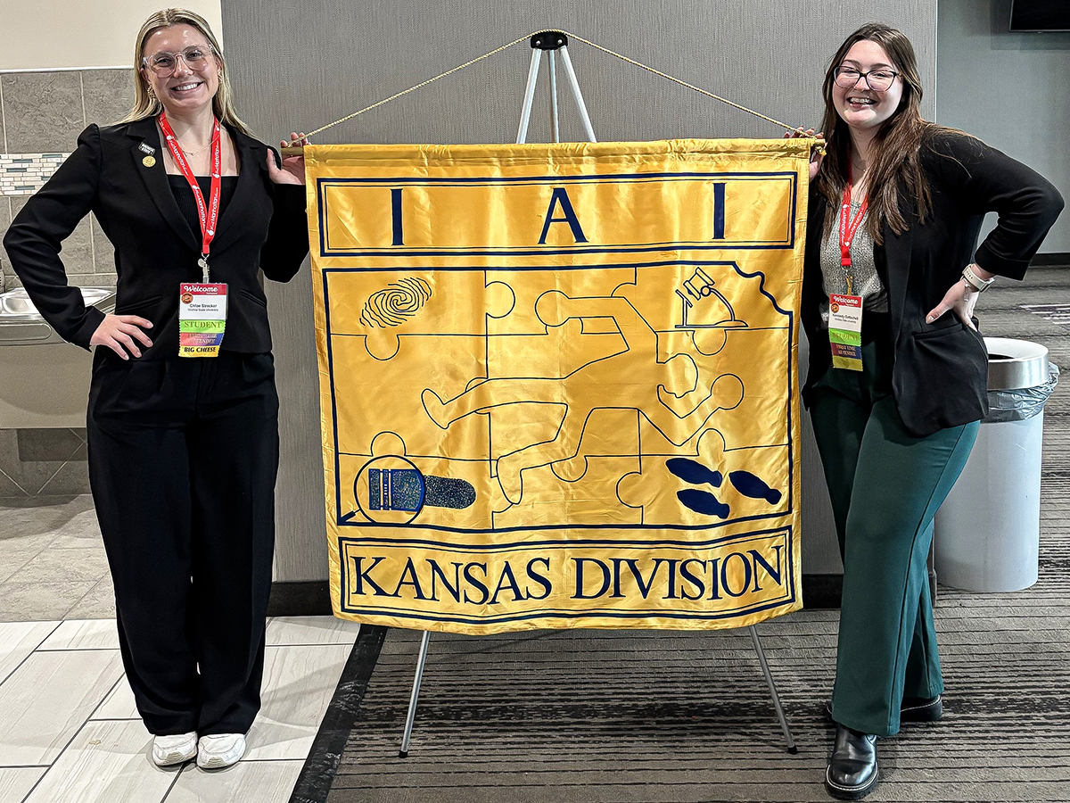 Chloe Strecker (left) at an International Association for Identification (IAI) conference.