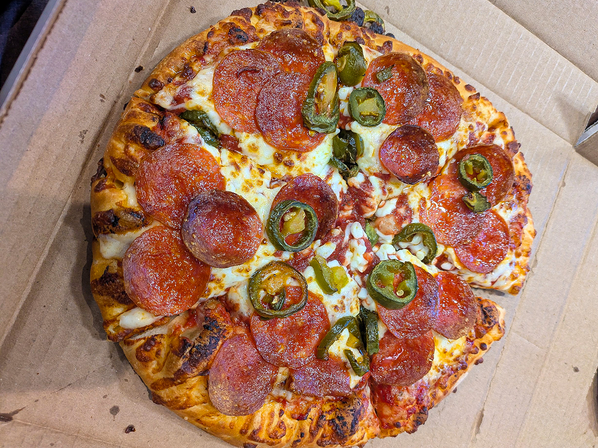 PIzza Shuttle 10" pie with pepperoni and jalapenos.