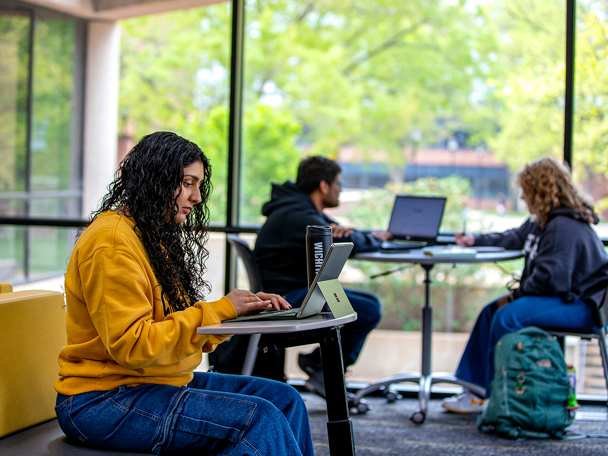 Students studying on the first floor of Ablah Library.