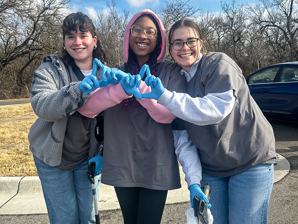 Amaya Willis with her Tri Delta sisters during Wu's Big Event assisting with the Wichita Cleam Streams initiative.