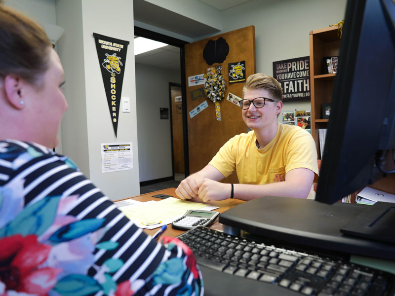 student with advisor