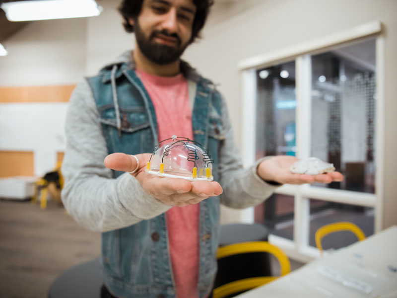 guy building snowglobe