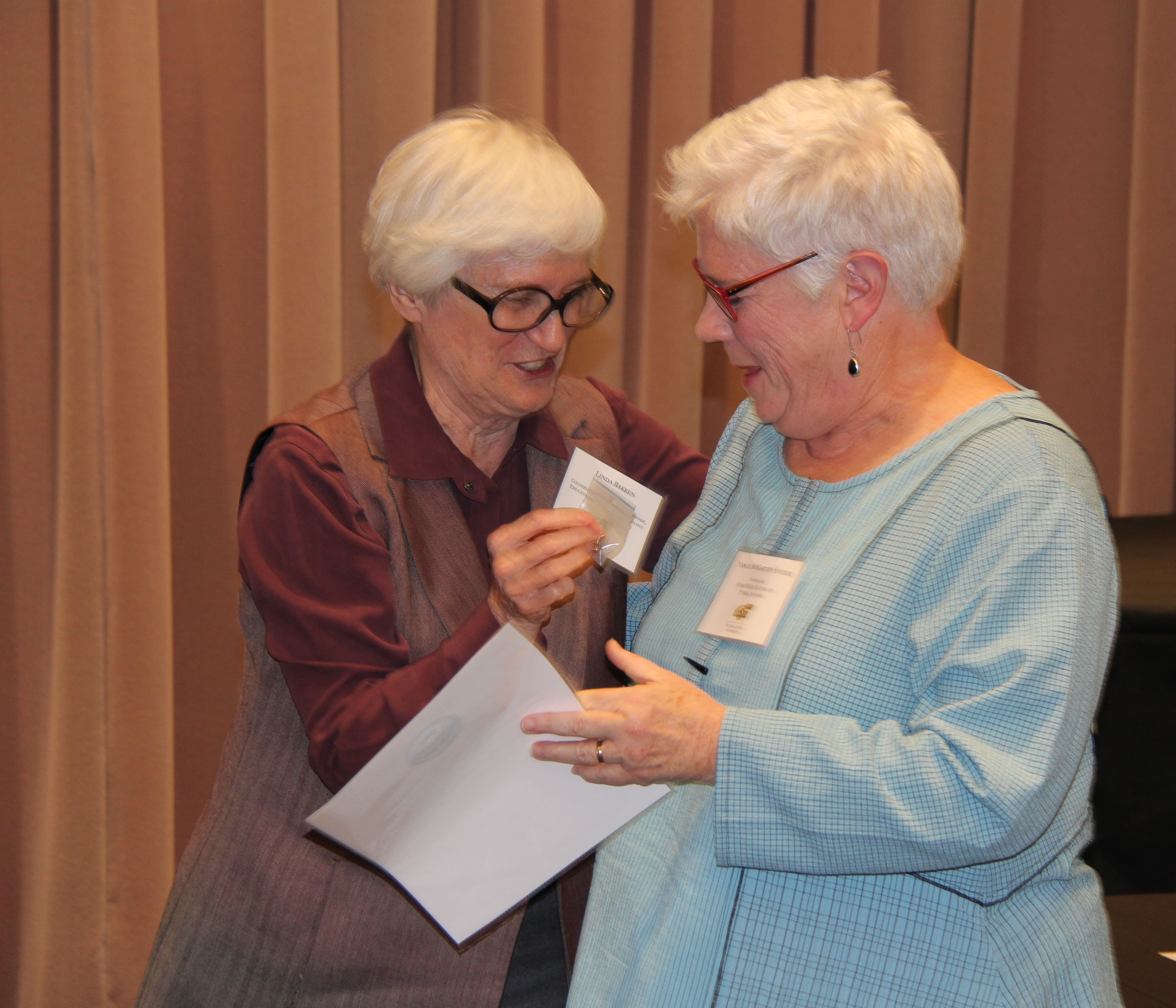 Photo of Linda Bakken and Nancy Snyder at the reception.