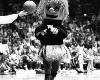 Wu playing hoops at halftime in Henry Leavitt Arena (now Charles Koch Arena).