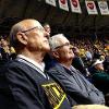 Dr. Bardo watches the Shockers with Senator Pat Roberts at Koch Arena.