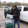 Ethan Finley-Flowers loading juice into a truck for VA Medical Workers Appreciation Day. 