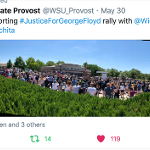 Protestors outside the WPD Patrol North substation, near Wichita State.