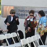 Attendees take their seats before the service