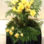 Memorial flower bouquet of yellow roses