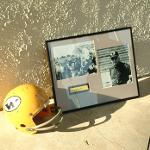 Memorial plaque and football helmet