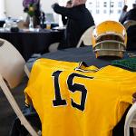 A WSU football jersey sits on a table
