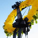 Memorial '70 wreath up close, shot from below