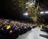 Yellow confetti rains down on the commencement crowd