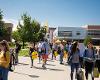 Students walk outside the Rhatigan Student Center