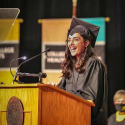 SGA President Rija Khan at the podium