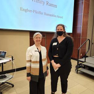 Trinity Ramm received the Engber-Pfeiffer Humanities Award from Dr. Kimberly Engber.