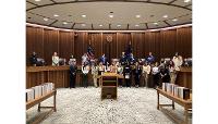 LEAD students from Wichita State, Kansas State and the University of Kansas traveled to Topeka to hear oral arguments presented to the Kansas Supreme Court. They gathered in the courtroom after court was adjourned. 