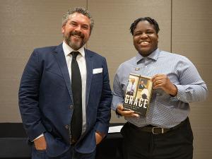 Cody Keenan poses with Omarian Brantley, SGA undergraduate Student Advocate, who moderated the student leader discussion.