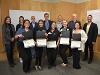 Holding their certificates, the members of Female Engineering Matters and the finals judges pose together.