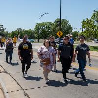 Several people walking within the cruise.