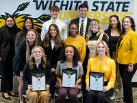 2024 Gore recipients, Karaline Scott, Karinton Newton and Chloe Strecker, pose with Jessica Gore and current Gore Scholars.