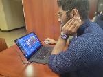A competitor leans forward intent on making the best plays. 