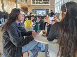 Two competitors are seated together as they compete in Venture Valley. 