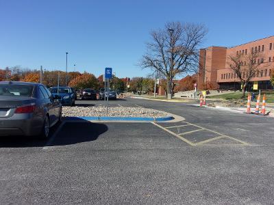 Photo of ADA parking spot SE of Ahlberg Hall. 