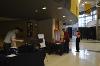 Team members of C Modular and MedX Innovations sets up their booths. 