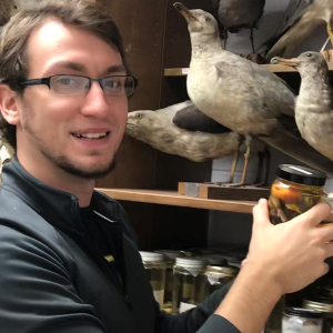 Guy in glasses with birds