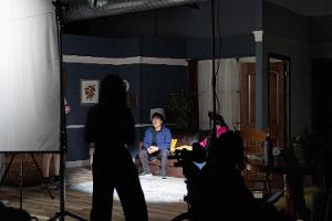 Acting for Digital Arts student on the sitcom set.