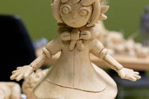 A clay model figure.