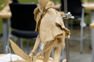 A clay model figure.