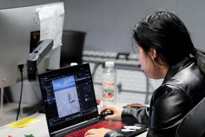 Student working in the motion capture software.