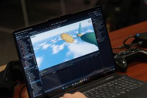 Student creating a video game.