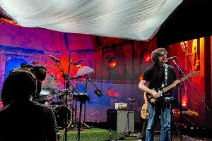 Local metal band performs in front of the LED volume for the Audio Engineering Society.