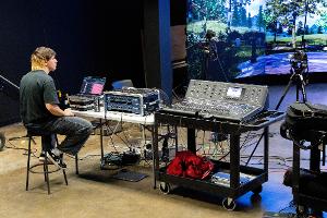 Student working the sound system.