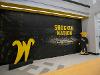 Display inside the Milly Marcus Annex featuring a “Shocker Nation” wall mural, a large yellow W sculpture, and a cutout of WuShock.