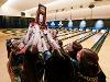 The Shocker women's bowling team holds up their trophy after winning the NCAA regional to advance to the NCAA Final Four.
