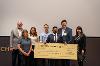 Astra System's Sivaganesh being handed the big check for placing first 