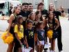 Members of the Shocker cheer team pose with fans at the Kansas State Fair.