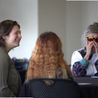 Cassity Sutton (center) asks Drs. Ballout and Hundley about the academic job market