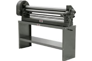Forms sheet metal into cylinders/cones; used for ducting, wraps, curved panels.