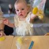 child playing with playdough
