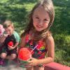 child with a snow cone