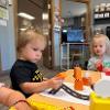 children playing with blocks at a table