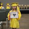 child in graduation gown