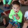 child with a snow cone