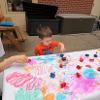 child creating artwork