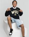 A student wears a WSU sweatshirt.